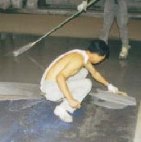 Concrete waterproofing treatment of damp or freshly laid concrete floors 