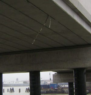 Cementitious Coating 851 applied to provide additional cover & concrete waterproofing to pre-cast, pre-stressed, bridge beams. Belvedere Riverside Energy from Waste Facility