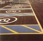 Demarcation of parking spaces on concrete floor
