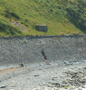 Masonry wall repairs in tidal areas with marine mortar.