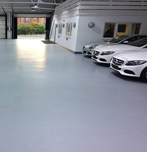 Concrete floor waterproofing in car showroom